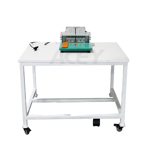 Tab cutting machine